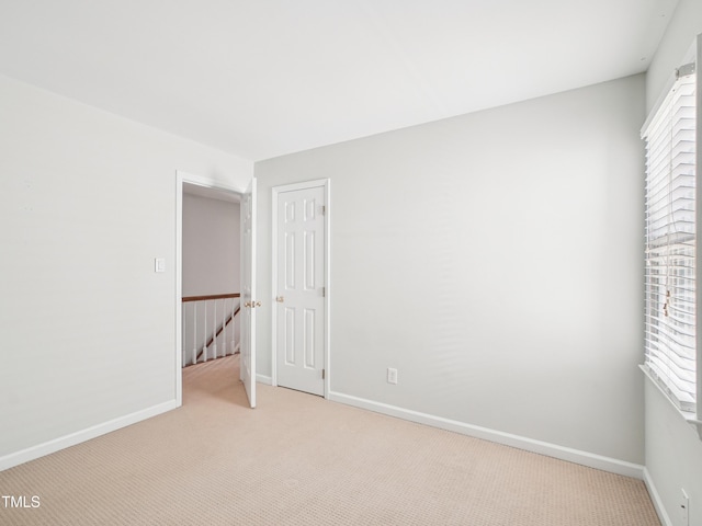3303 Glen Currin Dr, Raleigh, NC 27612 - empty room featuring light colored carpet and baseboards