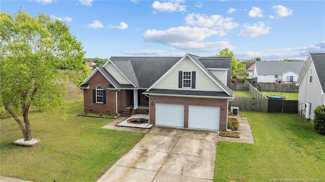 view of front of property with driveway, a front yard, and brick siding