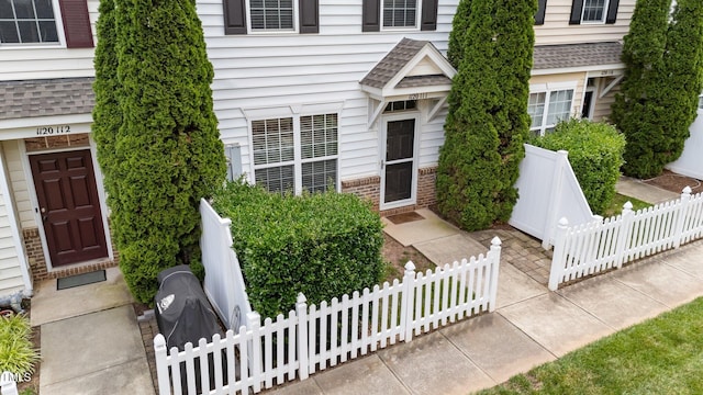 1120 Renewal Pl Unit 111, Raleigh, NC 27603 - entrance to property with brick siding and roof with shingles