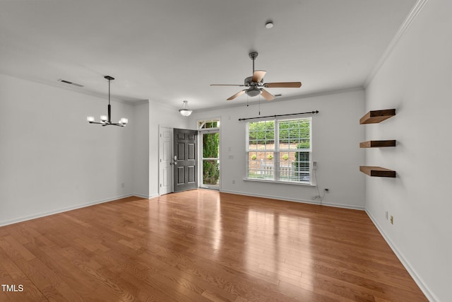 1120 Renewal Pl Unit 111, Raleigh, NC 27603 - unfurnished living room featuring a ceiling fan, a chandelier, ornamental molding, wood finished floors, and baseboards