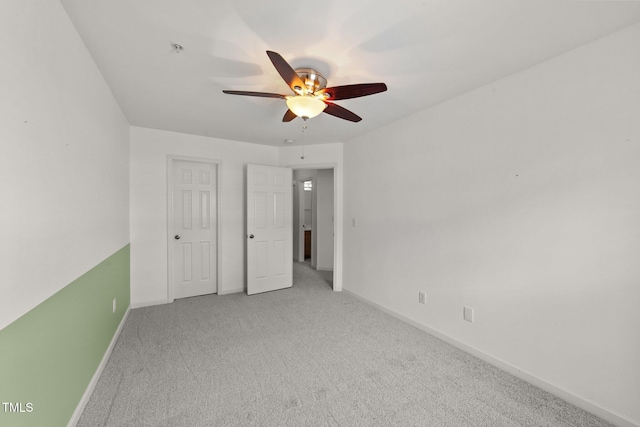 1120 Renewal Pl Unit 111, Raleigh, NC 27603 - unfurnished bedroom featuring carpet flooring, baseboards, and ceiling fan