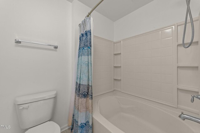 1120 Renewal Pl Unit 111, Raleigh, NC 27603 - bathroom featuring shower / bathtub combination with curtain and toilet