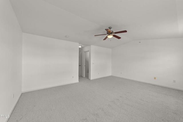 1120 Renewal Pl Unit 111, Raleigh, NC 27603 - spare room featuring a ceiling fan, vaulted ceiling, carpet, and baseboards
