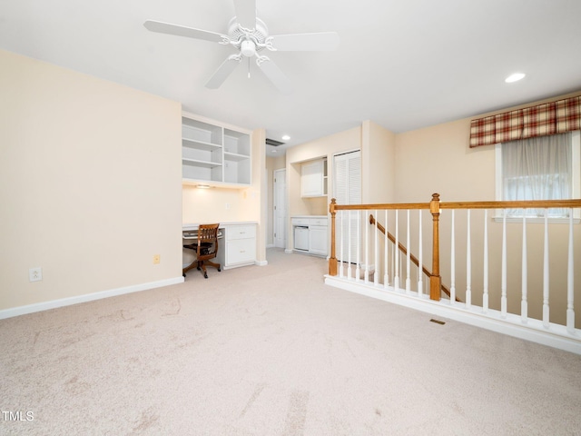 spare room featuring light carpet, baseboards, recessed lighting, and ceiling fan