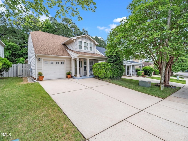 view of front of house featuring a garage, concrete driveway, a porch, and roof with shingles