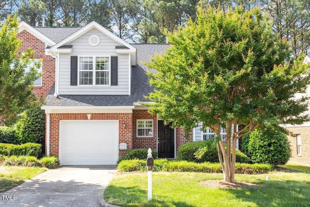 view of front facade featuring driveway, brick siding, a garage, a shingled roof, and a front yard