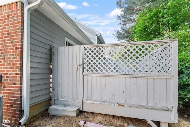 view of property exterior featuring brick siding