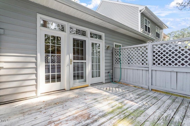 wooden deck featuring fence