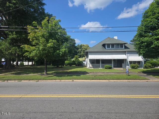 500 W Main St, Benson, NC 27504 - view of front of home with a front yard