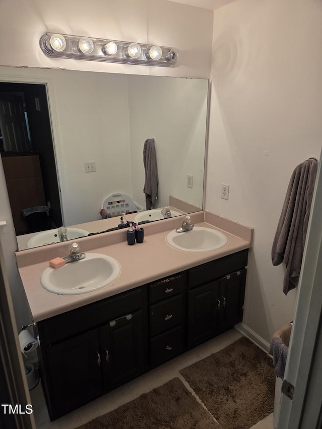 full bathroom featuring double vanity and tile patterned floors