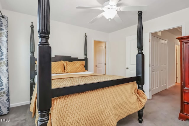carpeted bedroom featuring baseboards and a ceiling fan