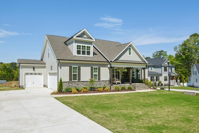 143 Sallyport Ct, Raleigh, NC 27603 - craftsman inspired home featuring board and batten siding, a porch, a front yard, an attached garage, and driveway