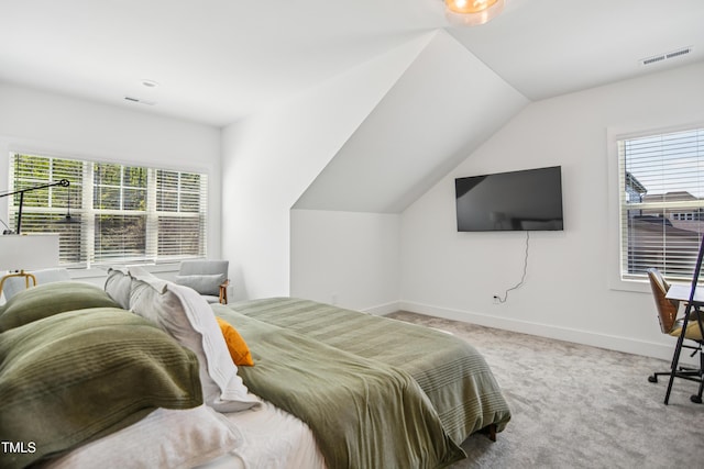 143 Sallyport Ct, Raleigh, NC 27603 - carpeted bedroom with visible vents, baseboards, and vaulted ceiling
