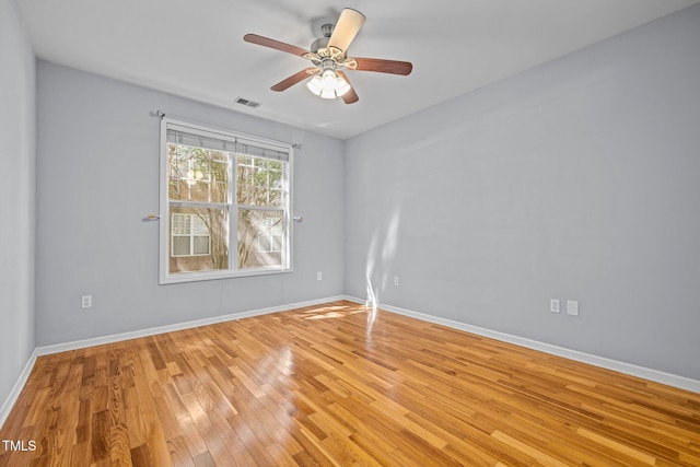 8231 Allyns Landing Way Unit 101, Raleigh, NC 27615 - unfurnished room with light wood-type flooring and a ceiling fan