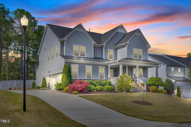 3037 Freeman Farm Way, Rolesville, NC 27571 - view of front of property featuring an attached garage, covered porch, concrete driveway, and a shingled roof