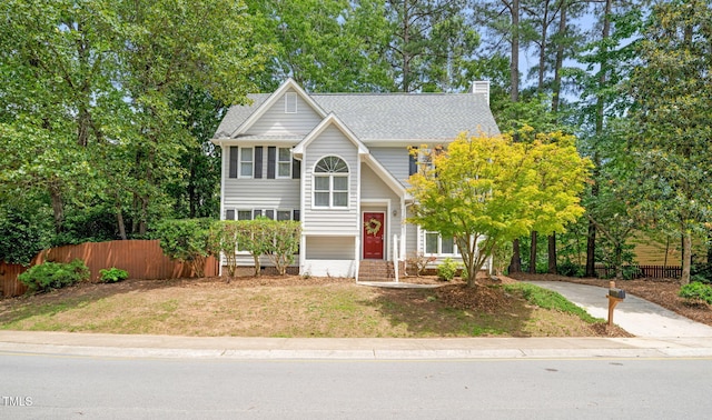 3008 Isabella Dr, Raleigh, NC 27603 - view of front of property with a chimney and a shingled roof