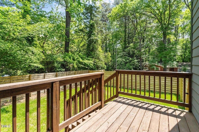 337 Merrywood Dr, Raleigh, NC 27610 - wooden terrace featuring a fenced backyard and a yard