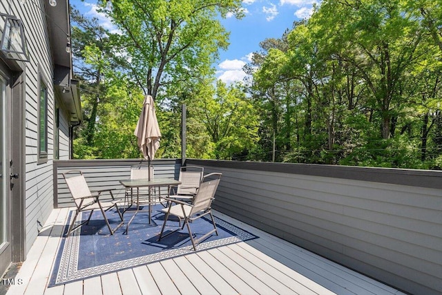 337 Merrywood Dr, Raleigh, NC 27610 - wooden deck with outdoor dining area