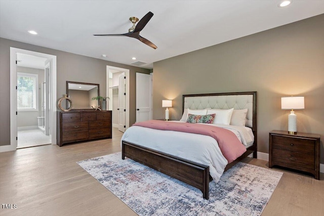 337 Merrywood Dr, Raleigh, NC 27610 - bedroom featuring recessed lighting, ensuite bath, and light wood finished floors