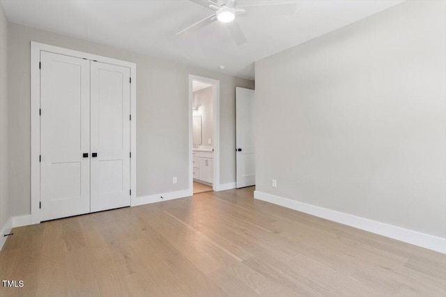 337 Merrywood Dr, Raleigh, NC 27610 - unfurnished bedroom featuring a ceiling fan, baseboards, connected bathroom, and light wood-style floors