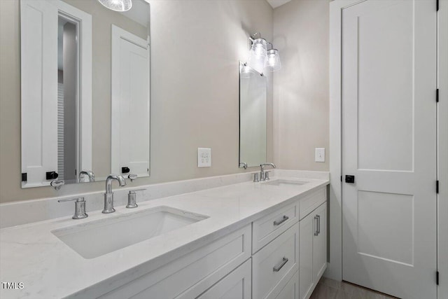 337 Merrywood Dr, Raleigh, NC 27610 - bathroom featuring double vanity and a sink