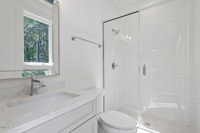 337 Merrywood Dr, Raleigh, NC 27610 - bathroom featuring a shower stall, toilet, and vanity