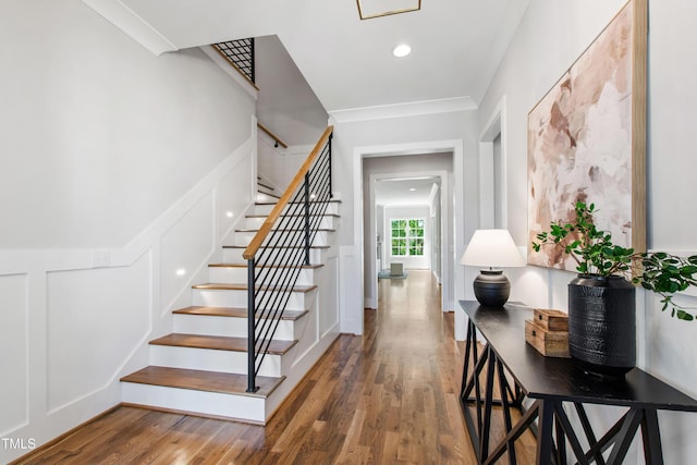 stairway with wood finished floors