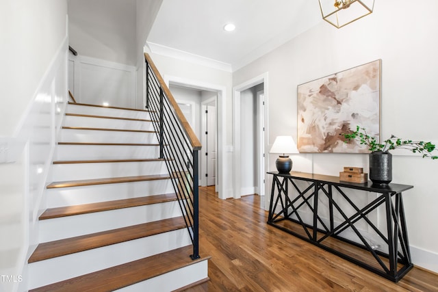 stairs featuring recessed lighting, wood finished floors, and baseboards