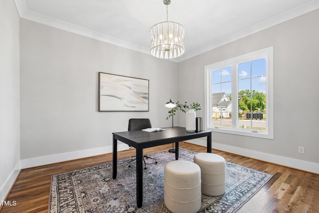 home office featuring an inviting chandelier, crown molding, wood finished floors, and baseboards
