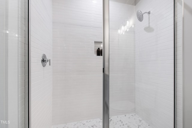 full bathroom featuring a stall shower