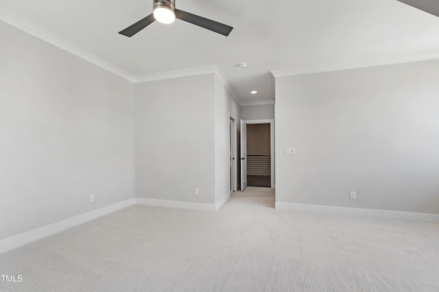 unfurnished room featuring recessed lighting, a ceiling fan, light carpet, crown molding, and baseboards