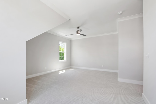 bonus room featuring baseboards, a ceiling fan, and carpet flooring