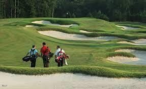 surrounding community with a water view and golf course view