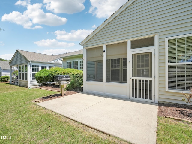 519 Garendon Dr, Cary, NC 27519 - view of patio featuring a sunroom