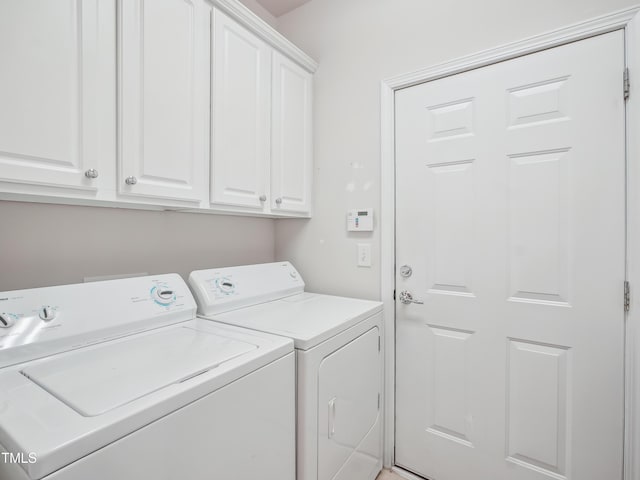 519 Garendon Dr, Cary, NC 27519 - laundry area with cabinet space and washer and clothes dryer