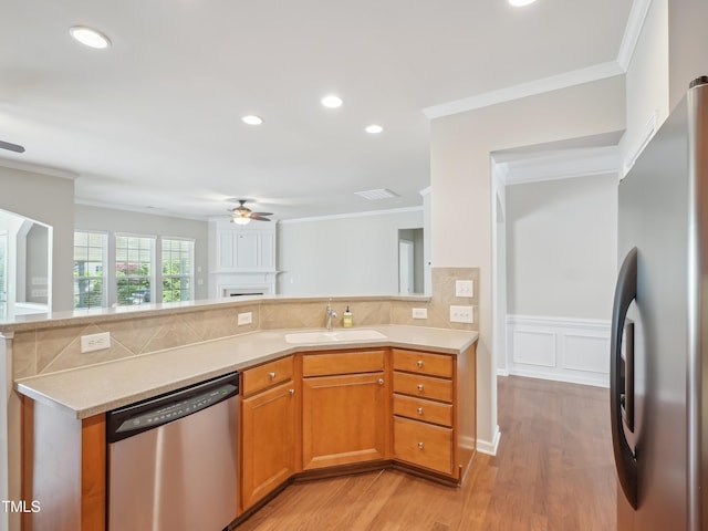 519 Garendon Dr, Cary, NC 27519 - kitchen with a ceiling fan, a sink, appliances with stainless steel finishes, and light countertops
