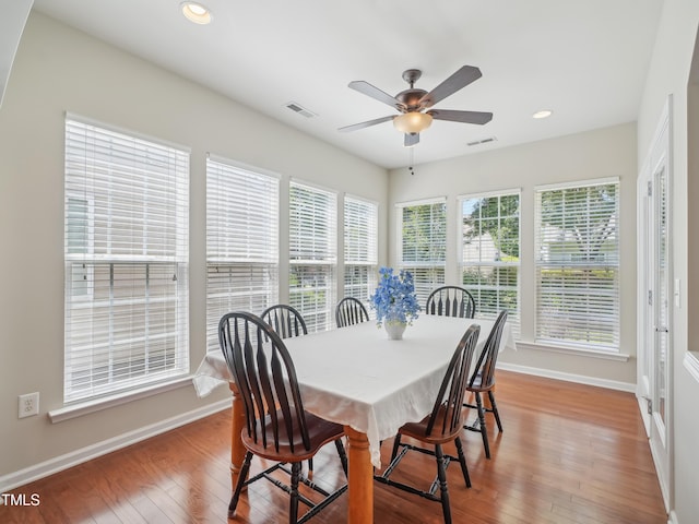 519 Garendon Dr, Cary, NC 27519 - dining space featuring baseboards, ceiling fan, wood finished floors, and visible vents