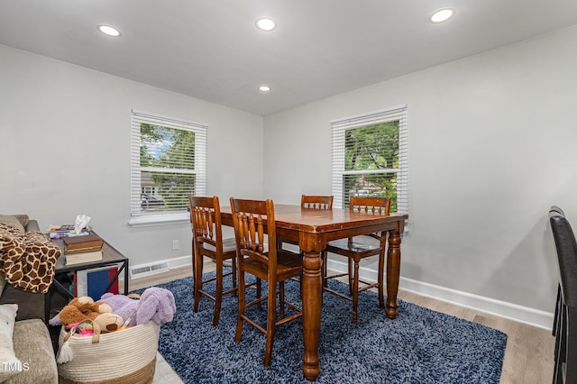 2522 N Roxboro St, Durham, NC 27704 - dining space with healthy amount of natural light, baseboards, recessed lighting, and wood finished floors