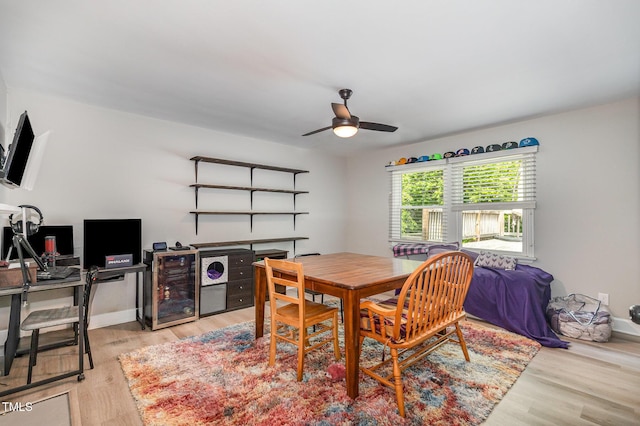 2522 N Roxboro St, Durham, NC 27704 - dining area featuring ceiling fan, light wood-style floors, wine cooler, and a desk