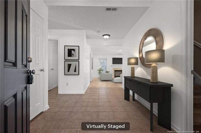 705 Fairfield Cir, Raeford, NC 28376 - hallway with tile patterned flooring and baseboards
