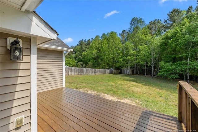 705 Fairfield Cir, Raeford, NC 28376 - wooden deck with a shed and an outbuilding