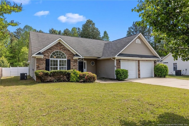 705 Fairfield Cir, Raeford, NC 28376 - ranch-style home featuring a garage, driveway, cooling unit, a shingled roof, and stone siding