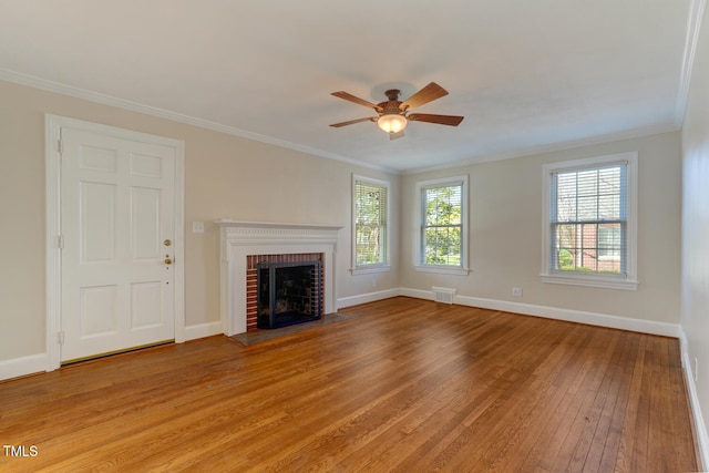 unfurnished living room with a fireplace, light wood-type flooring, a ceiling fan, visible vents, and baseboards