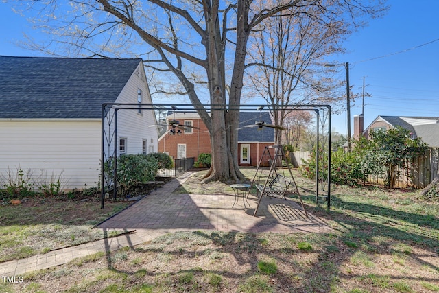 view of yard with a patio area and fence
