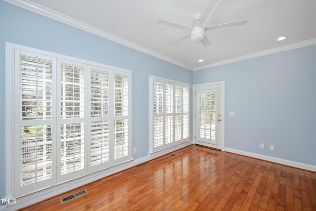 2420 Mollynick Ln, Wake Forest, NC 27587 - spare room with ceiling fan, plenty of natural light, baseboards, ornamental molding, and recessed lighting