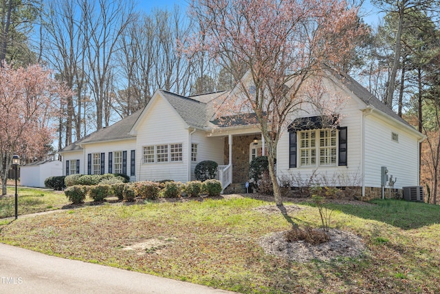 2420 Mollynick Ln, Wake Forest, NC 27587 - traditional-style home with central AC, a front lawn, and a shingled roof