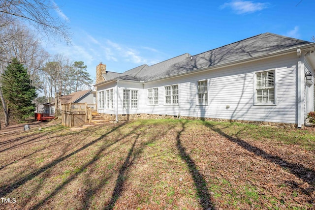 2420 Mollynick Ln, Wake Forest, NC 27587 - rear view of house featuring a chimney, a yard, and crawl space