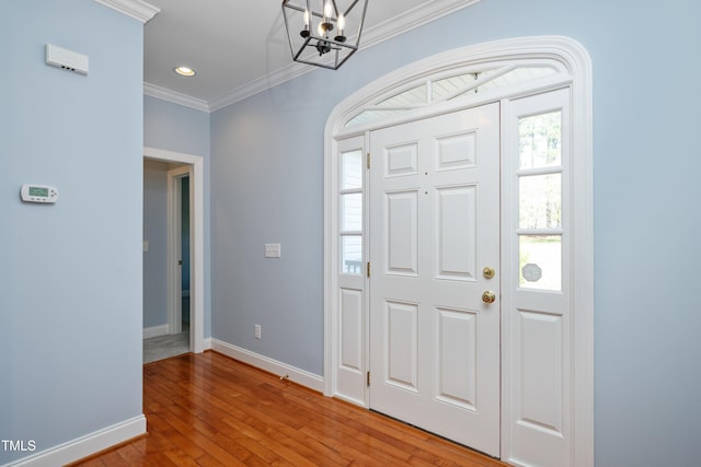 2420 Mollynick Ln, Wake Forest, NC 27587 - entryway featuring crown molding, a chandelier, baseboards, hardwood / wood-style floors, and recessed lighting