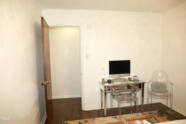 office with baseboards and wood finished floors