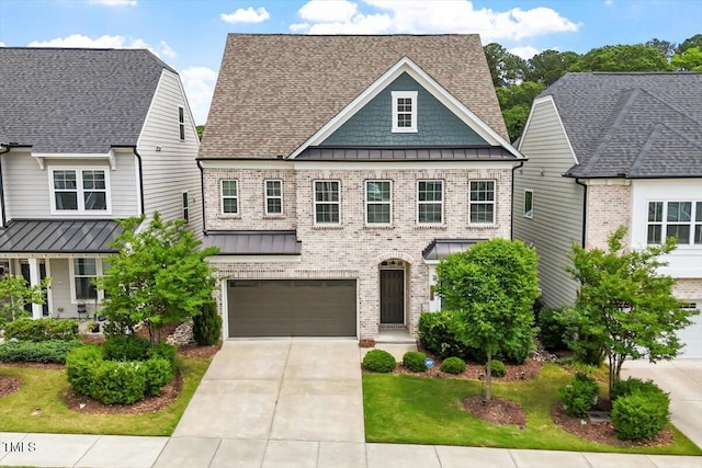 113 Mazarin Ln, Cary, NC 27519 - view of front of property with a standing seam roof, brick siding, concrete driveway, and an attached garage
